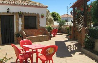 Apartamentos Cuevas de María